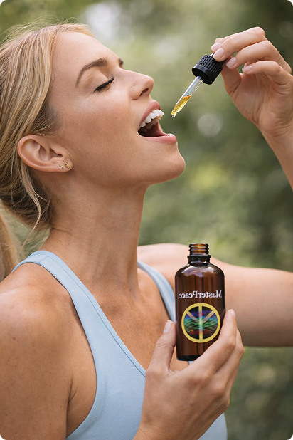 Woman taking MasterPeace drops